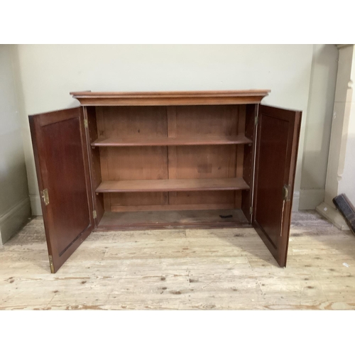 178 - A Victorian mahogany two door cupboard (the upper section from a larger piece of furniture), 113cm w... 