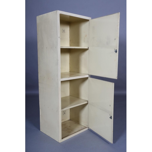 134 - A Jalray cream finished metal cabinet c.1950 of two doors with black curved handles, 51cm wide x 41c... 