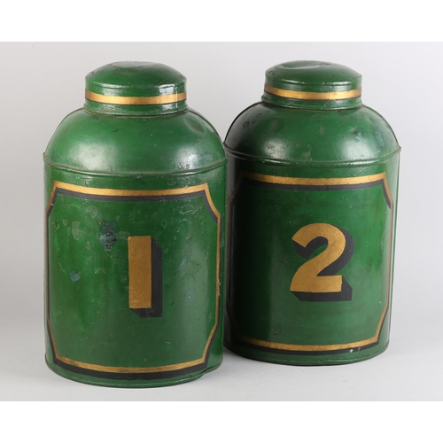 161 - A pair of 19th century toleware tea canisters, cylindrical, the green ground with panel and numbers ... 