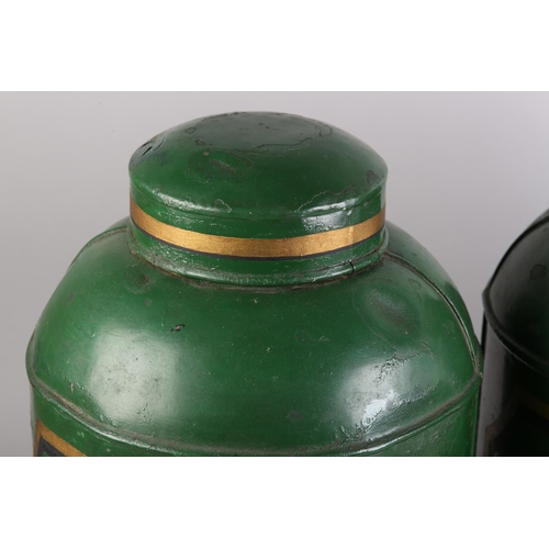 161 - A pair of 19th century toleware tea canisters, cylindrical, the green ground with panel and numbers ... 