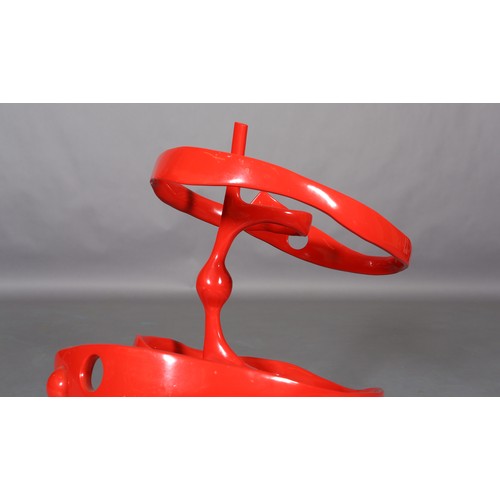 297 - ARR Michael Benn (1937-2017), Waste Away, red enamelled aluminium sculpture of a water vortex, on tr... 