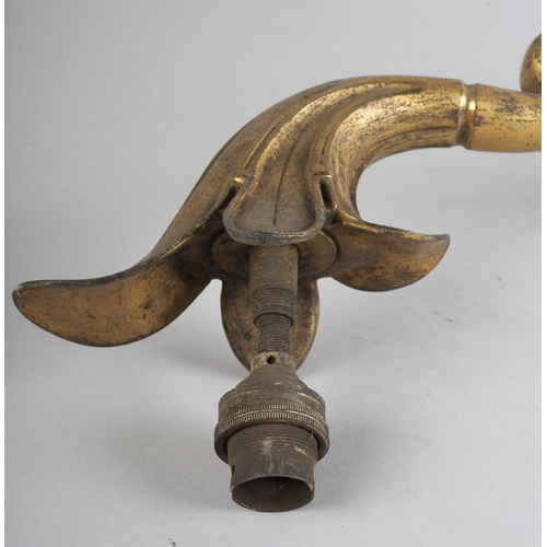 94 - A Victorian lacquered brass wall sconce with foliate plate and swing arm, approximate 56cm long