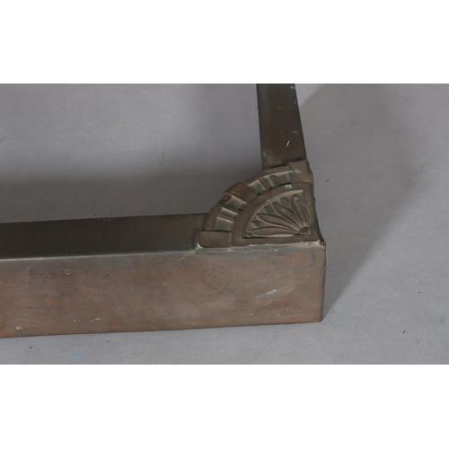 423 - A copper covered fire kerb, c.1915, with central and corner foliate embossed panels, 110cm wide x 35... 