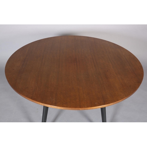 441 - An early G Plan mahogany and ebonised circular dining table, c.1950s, the tapered legs joined by a b... 