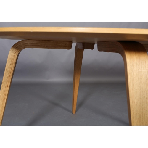 442 - A Gubi laminated beech dining table by  Komplot Design, circular, on laminated square tapered and sp... 