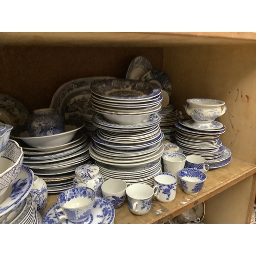 115 - A large quantity of blue and white ware including meat dishes, tureens, bowls and plates in Yuan war... 