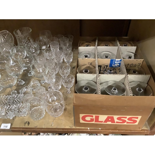 118 - A set of twelve cut glass hock glasses in original packaging together with cut and plain glass desse... 