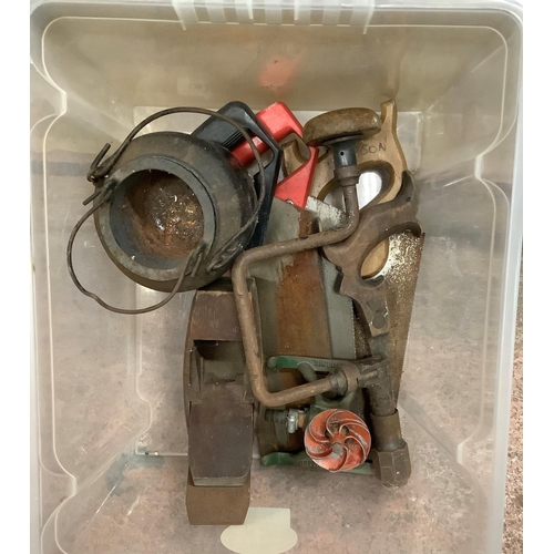 125 - A vintage garden sprinkler, a bit and brace, plane, smelting pot, saws etc