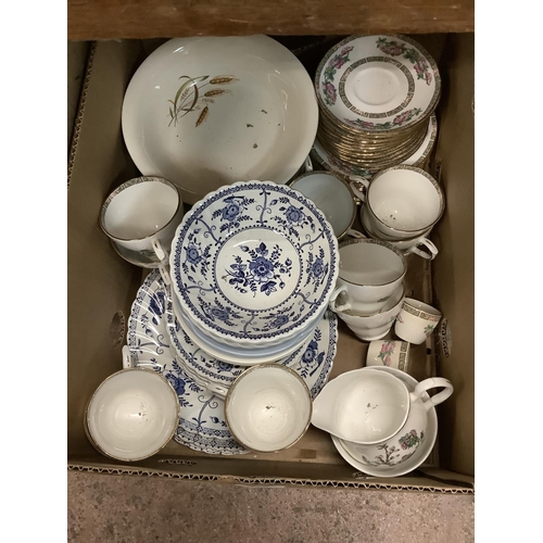 129 - A collection of mixed teaware including Indian Tree, blue and white ware etc