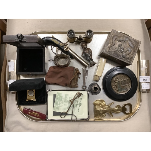 167 - A collection of items including a replica percussion pistol, an elephant mask bottle opener, a repro... 