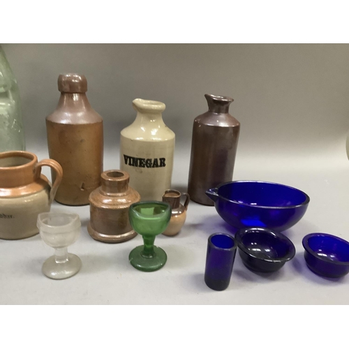 237 - Salt glaze and stoneware bottles, jars and jugs, a vintage pop bottle, blue glass liners etc