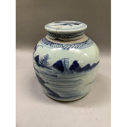 243 - A Chinese stoneware blue and white ginger jar and cover painted with a continuous river and island s... 