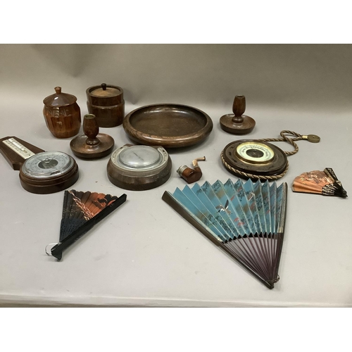 254 - A collection of treen including barometer, jars and covers, fruit bowl, pair of candlesticks etc