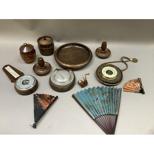 254 - A collection of treen including barometer, jars and covers, fruit bowl, pair of candlesticks etc