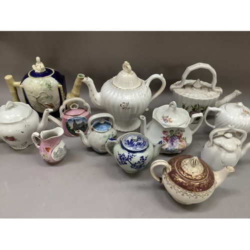 262 - A collection of Victorian and later teapots