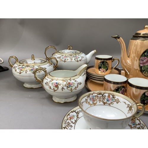 293 - A Noritake china twelve piece coffee service, on a gilt ground and a Noritake cream jug and sugar bo... 