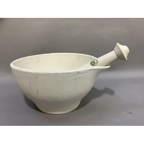 31 - A Mason Cash vitrified ceramic mortar and pestle, 32cm diameter x 18.5cm high