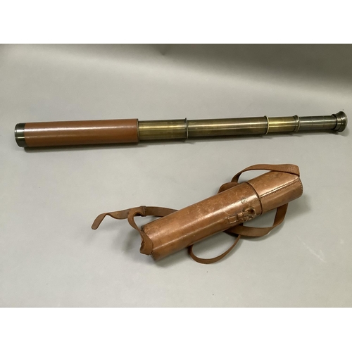 40 - A brass four drawer telescope in leather case initialled KF, closed measurement 27.5cm long