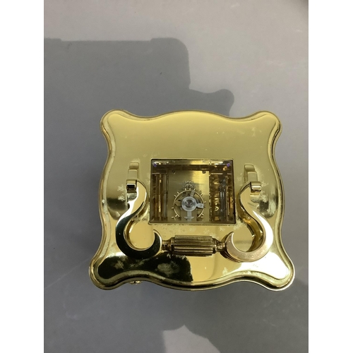 41 - A hand polished brass carriage clock by Matthew Norman having a white enamel dial with Roman numeral... 