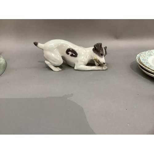 103 - A Royal Copenhagen figure of a terrier with bone, printed and painted marks to underside
9cm high x ... 