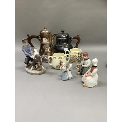 222 - A silver plated teapot and hot water jug with Celtic band, a Royal Copenhagen figure of Dutch boy an... 