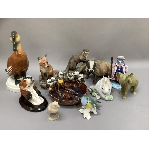 226 - A collection of animal figures including Australian pottery dish with seven kookaburras perched on t... 