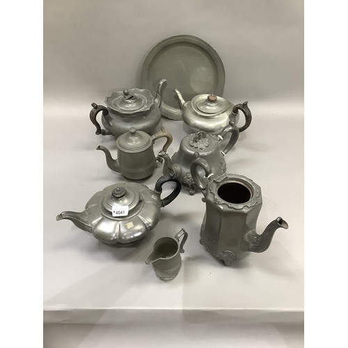 266 - A quantity of Victorian pewter teapots etc