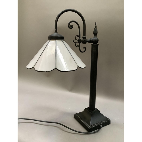 285 - A pale pink and black metal table lamp  with arched arm, 48.5cm high