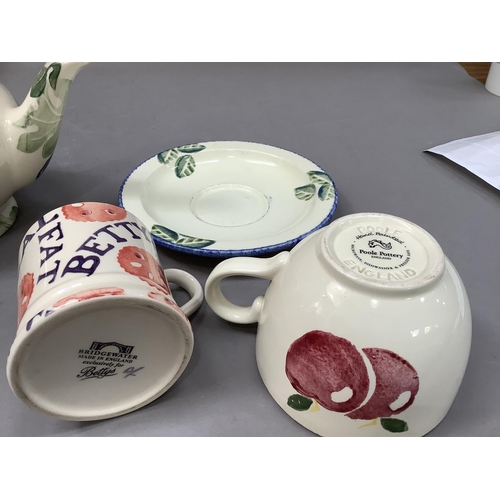 301 - A Bridgewater hand painted teapot of leaf design together with a Betty's mug and a pig decorated  mu... 