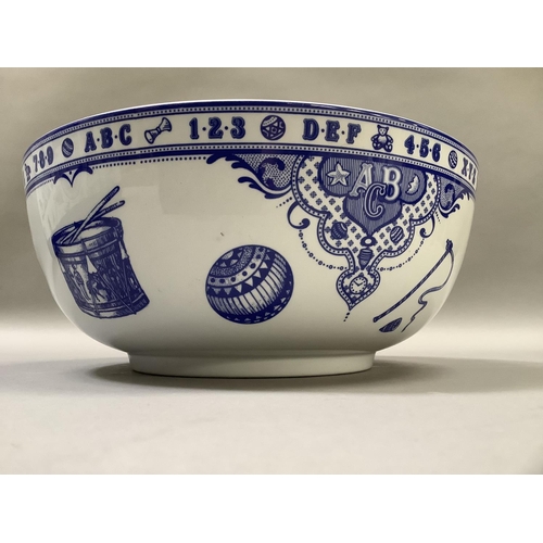 33 - A large Spode blue and white bowl from the Edwardian Childhood range, printed with rocking horse, dr... 