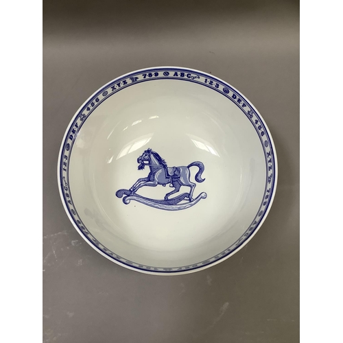 33 - A large Spode blue and white bowl from the Edwardian Childhood range, printed with rocking horse, dr... 