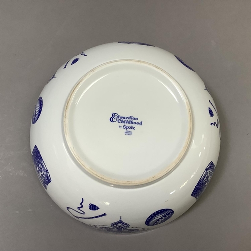 33 - A large Spode blue and white bowl from the Edwardian Childhood range, printed with rocking horse, dr... 