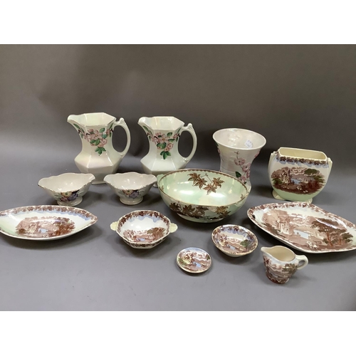 330 - Items of Malingware including a pair of apple blossom jugs and similar vase, various bowls, two hand... 