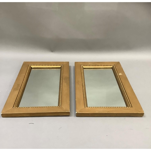 346 - A pair of gilt framed wall mirrors, rectangular with beaded slips, 47cm x 46.5cm