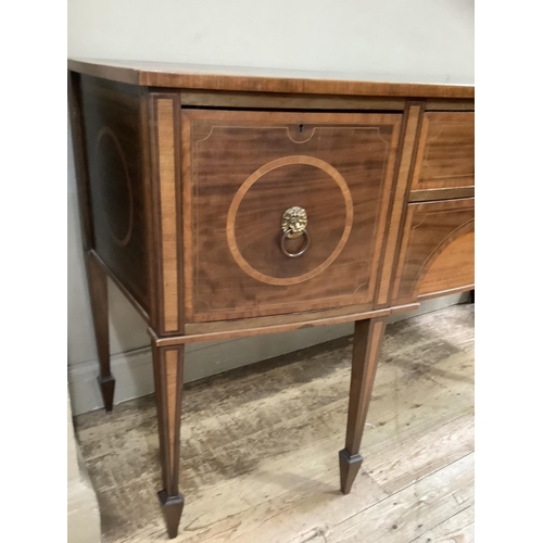 417 - An Edwardian mahogany and satinwood banded bow front sideboard, crossbanded and with line inlay havi... 