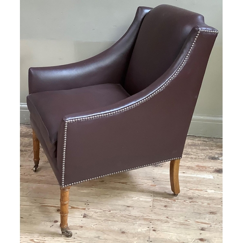 421 - A reproduction  library chair of George IV style, upholstered in dark brown hide with close nail stu... 