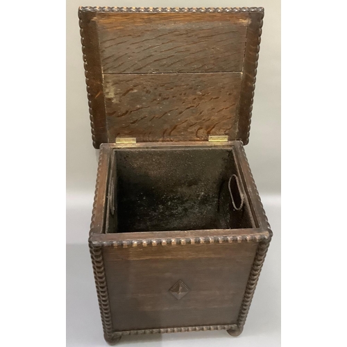 425 - a 1930s oak coal box having beaded rims and corners on compressed bun feet with metal liner, 41cm wi... 