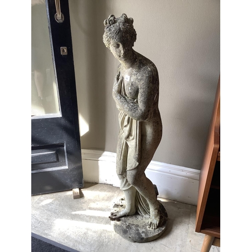 428 - A concrete cast garden statue of a classical female, 115cm high