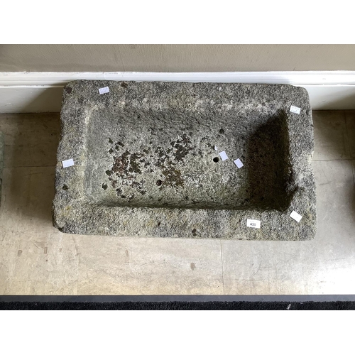 430 - A stone trough 76cm wide x 26cm high x 47cm deep, with drainage hole