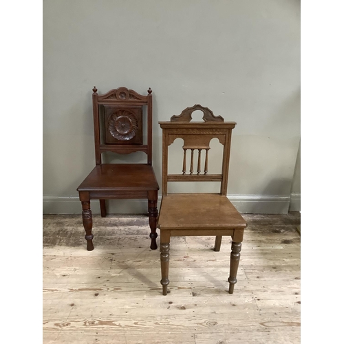 460 - Two Victorian hall chairs in walnut and oak