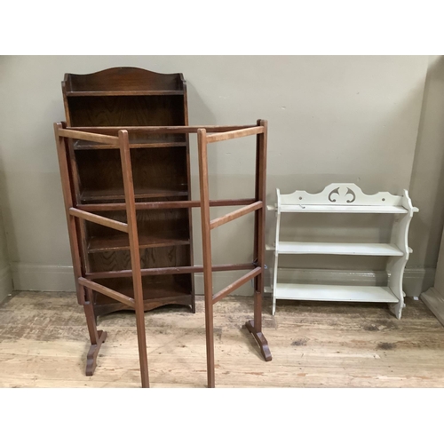 148 - A set of early 20th century oak bookshelves, 46cm wide together with a set of white painted wall she... 