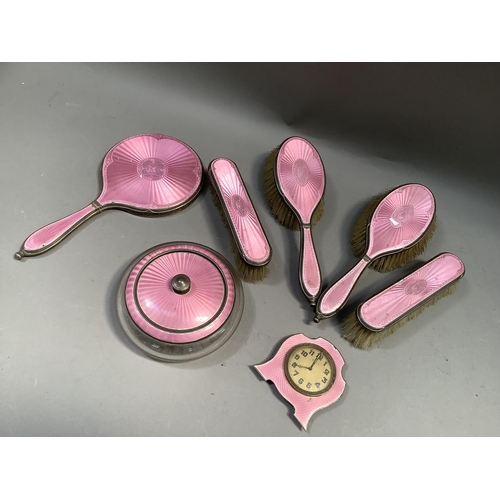 375B - A George V silver and pink enamelled dressing table set with hallmarks for London 1926, 27 and 1930,... 