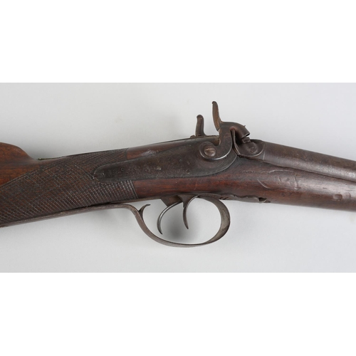 114B - A 19th century double barrelled percussion shot gun by Gooch in 12 gauge, damascus barrel, swan neck... 