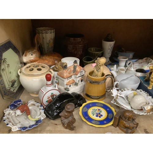 120 - A large quantity of ornaments including vases, jugs, shaving mugs, figures of monks and other items,... 