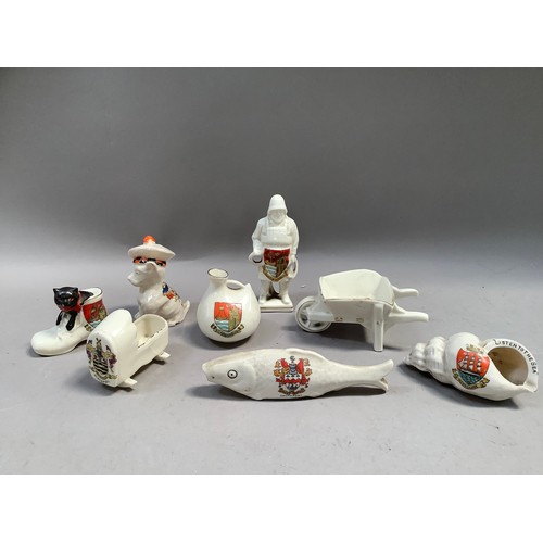 229 - A collection of crested china with crests for Blackpool, Scarborough, Southport and Morecambe and in... 