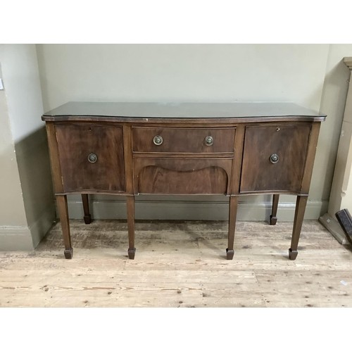 180 - A Georgian style mahogany serpentine fronted sideboard having two drawers to the centre flanked by a... 