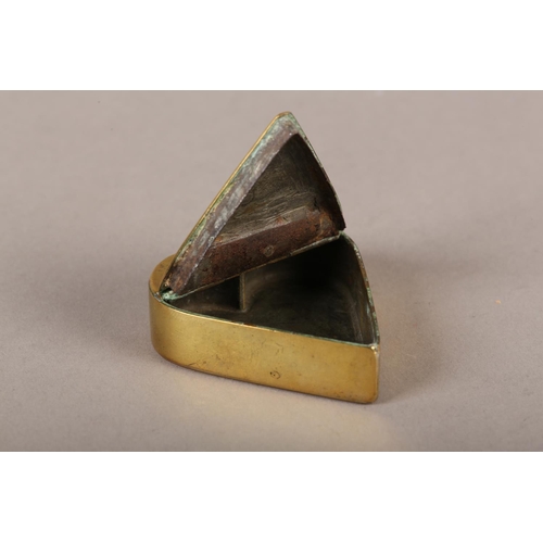 AN EARLY VICTORIAN WELSH BRASS HEART-SHAPED SNUFF BOX, engraved to the ...