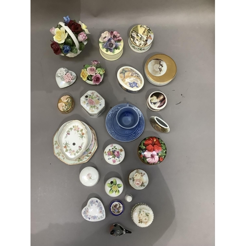 45 - A collection of china flower clusters, trinket boxes, trinket dishes, cabinet cups and saucer etc