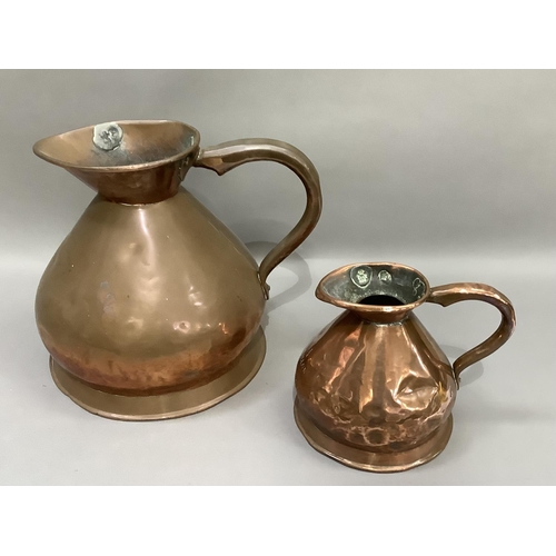 64 - A two gallon copper measure and a half gallon copper measure