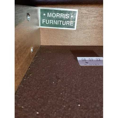 79 - A modern cherry wood finish sideboard having a drawer to the centre above two door cupboard flanked ... 